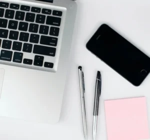 Laptop and smartphone at desk