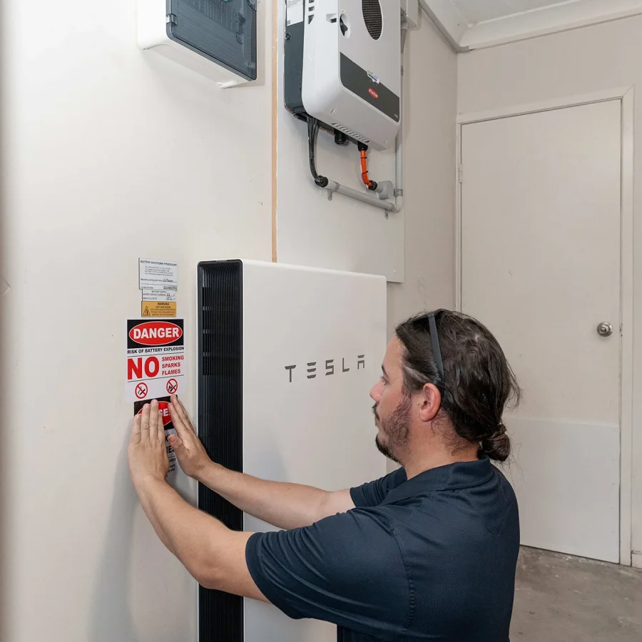 Man working on solar battery installation
